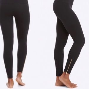 Spanx black leggings with gold ankle zippers